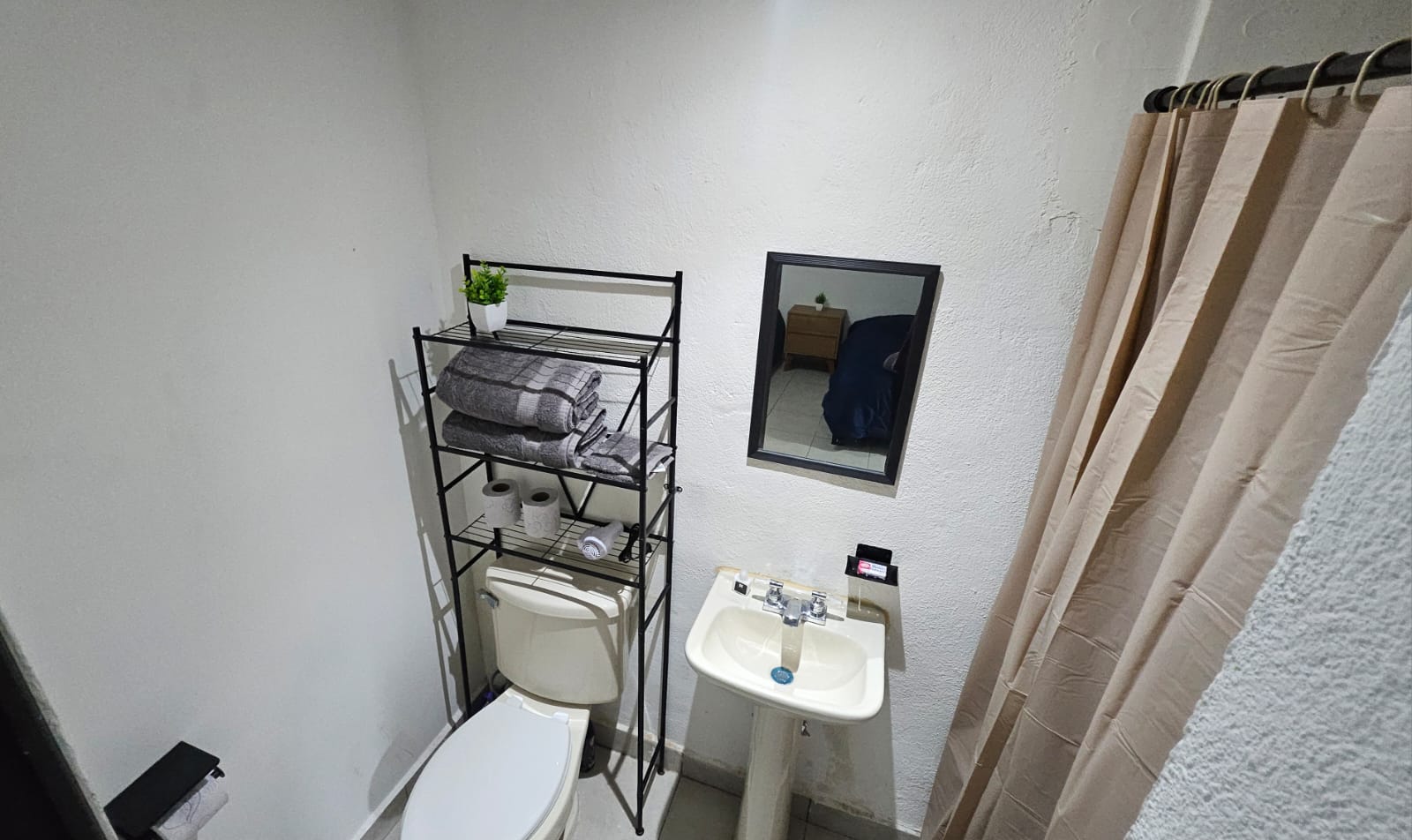 El Loft donde se ve el baño visto dese arriba